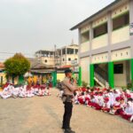 Batalyon D Pelopor Satbrimob Polda Metro Jaya Tanamkan Wawasan Kebangsaan melalui Program Goes To School di SDN Karangasih 08